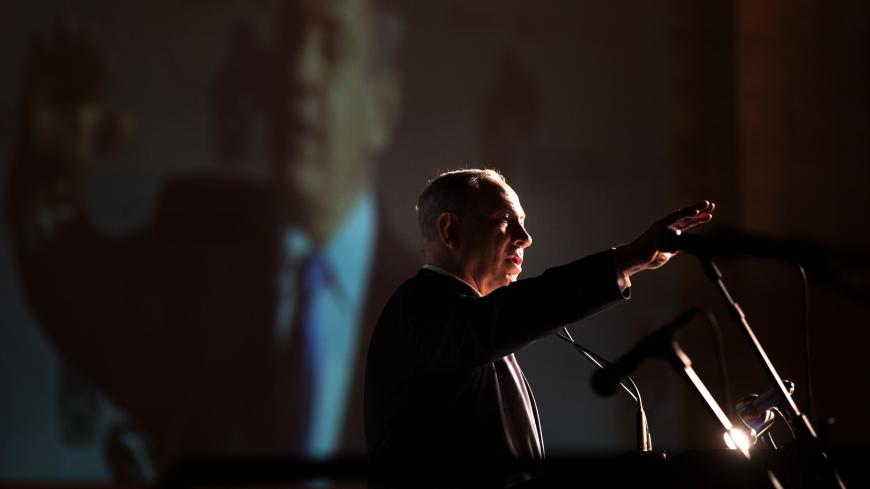 Israeli Prime Minister Benjamin Netanyahu delivers a speech at the 5th Global Forum for Combating Anti-Semitism conference at the International Convention Center in Jerusalem, on May 12, 2015. AFP PHOTO / MENAHEM KAHANA        (Photo credit should read MENAHEM KAHANA/AFP via Getty Images)