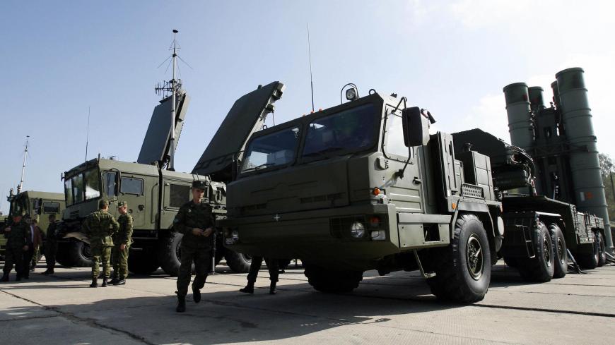 Russian soldiers examine the S-400 Triumph rocket systems in Elektrostal, 06 August 2007. Russia's long-delayed Triumph anti-aircraft missile system was activated around Moscow today in an upgrade of the capital's air defences, Russian military officials said. In mid-July Russia successfully tested the long-delayed S-400 missiles, also known by their NATO designation SA-21 Growler. The director of the Almaz plant that designed the rockets, Igor Ashurbeily, told the Interfax news agency that the company expe