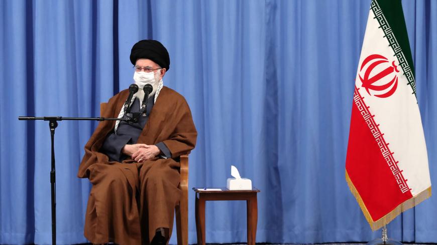 A handout picture provided by the office of Iran's Supreme Leader Ayatollah Ali Khamenei on October 24, 2020, shows him wearing a protective face mask as he gives a speech in the capital Tehran during a meeting of the national staff to discuss the issue of the novel coronavirus pandemic crisis. (Photo by - / KHAMENEI.IR / AFP) / XGTY / === RESTRICTED TO EDITORIAL USE - MANDATORY CREDIT "AFP PHOTO / HO / KHAMENEI.IR" - NO MARKETING NO ADVERTISING CAMPAIGNS - DISTRIBUTED AS A SERVICE TO CLIENTS === (Photo by 