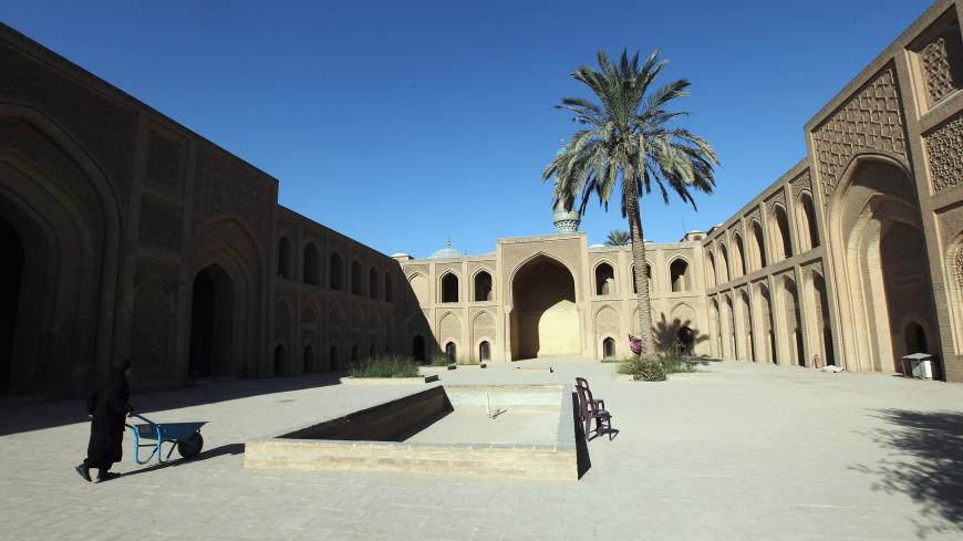 BAGHDAD, IRAQ - NOVEMBER 30:  A woman works at the restored Al-Mustansiriya University, founded in 1227 and one of the oldest Islamic universities in the world, on November 30, 2011 in Baghdad, Iraq. Iraq is transitioning as the U.S. military continues its withdrawal from the country by the end of December following the war that began in 2003. (Photo by Mario Tama/Getty Images)