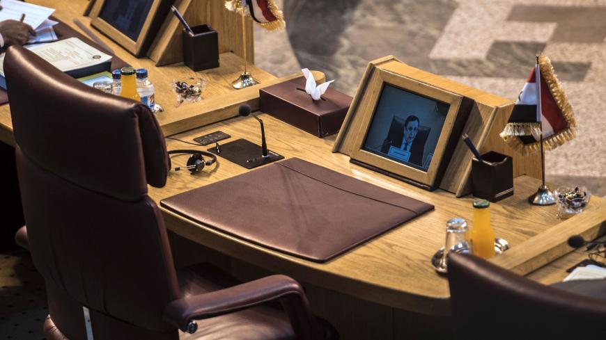 The empty seat of Syria is seen during a meeting of foreign ministers at the headquarters of the Arab League in the Egyptian capital Cairo, on March 7, 2017. / AFP PHOTO / KHALED DESOUKI        (Photo credit should read KHALED DESOUKI/AFP via Getty Images)