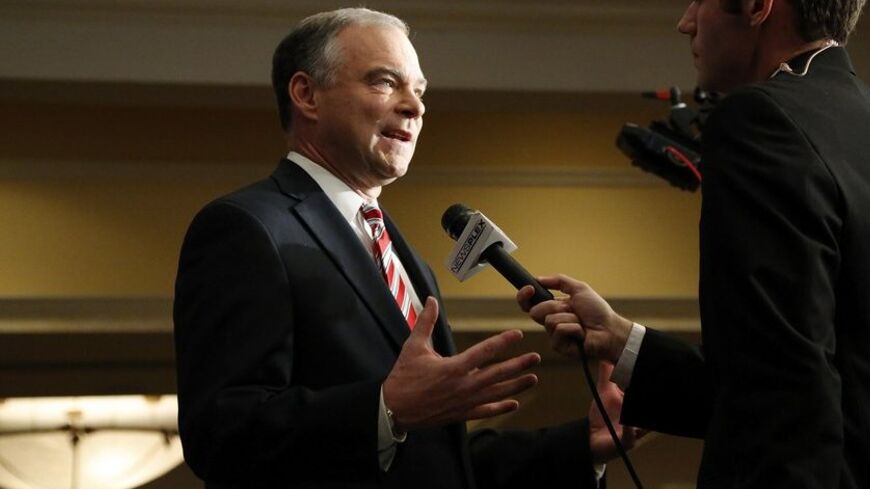 Democratic U.S. Senate candidate Tim Kaine (D-VA) does a series of interviews at the site of his election-night party during the U.S. presidential election in Richmond, Virginia November 6, 2012. REUTERS/Jonathan Ernst (UNITED STATES - Tags: POLITICS ELECTIONS USA PRESIDENTIAL ELECTION) - RTR3A32N