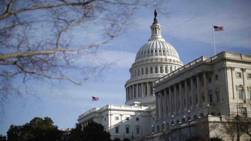 A general view of the U.S. Capitol building in Washington February 28, 2013. Positions hardened on Wednesday between U.S. President Barack Obama and Republican congressional leaders over the budget crisis even as they arranged to hold last-ditch talks to prevent harsh automatic spending cuts beginning this week. Looking resigned to the $85 billion in "sequestration" cuts starting on Friday, government agencies began reducing costs and spelling out to employees how furloughs will work. REUTERS/Jason Reed