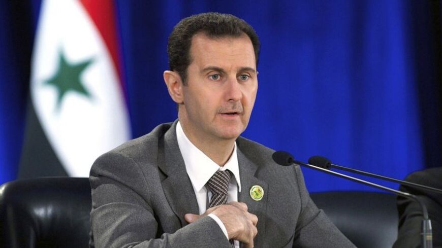 Syria's President Bashar al-Assad speaks during his meeting with the leadership al-Baath party of Damascus countryside,in Damascus March 8, 2014,in this handout released by Syria's national news agency SANA. REUTERS/SANA/Handout via Reuters (SYRIA - Tags: POLITICS CONFLICT CIVIL UNREST ) ATTENTION EDITORS - THIS IMAGE WAS PROVIDED BY A THIRD PARTY. FOR EDITORIAL USE ONLY. NOT FOR SALE FOR MARKETING OR ADVERTISING CAMPAIGNS. THIS PICTURE IS DISTRIBUTED EXACTLY AS RECEIVED BY REUTERS, AS A SERVICE TO CLIENTS