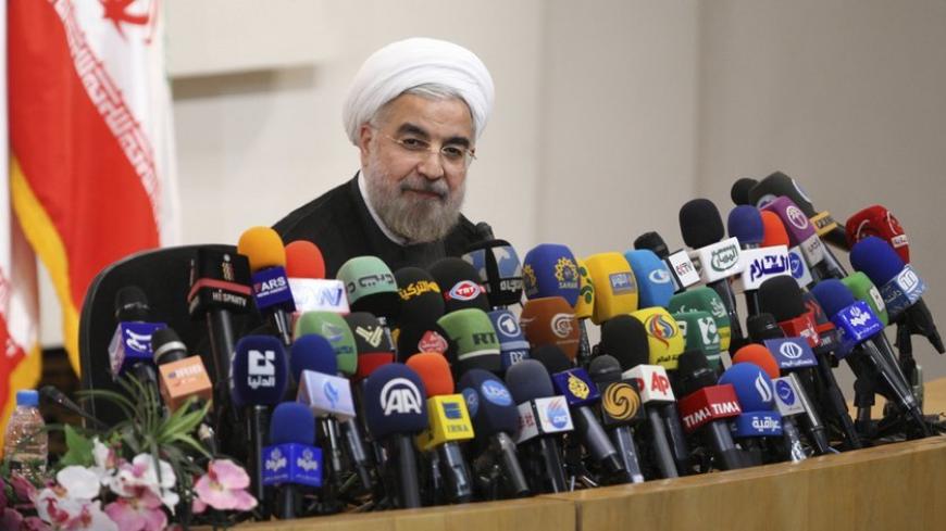Iranian President-elect Hassan Rouhani speaks with the media during a news conference in Tehran June 17, 2013. REUTERS/Fars News/Majid Hagdost (IRAN - Tags: POLITICS PROFILE) ATTENTION EDITORS - THIS IMAGE WAS PROVIDED BY A THIRD PARTY. FOR EDITORIAL USE ONLY. NOT FOR SALE FOR MARKETING OR ADVERTISING CAMPAIGNS. THIS PICTURE IS DISTRIBUTED EXACTLY AS RECEIVED BY REUTERS, AS A SERVICE TO CLIENTS - RTX10QWN