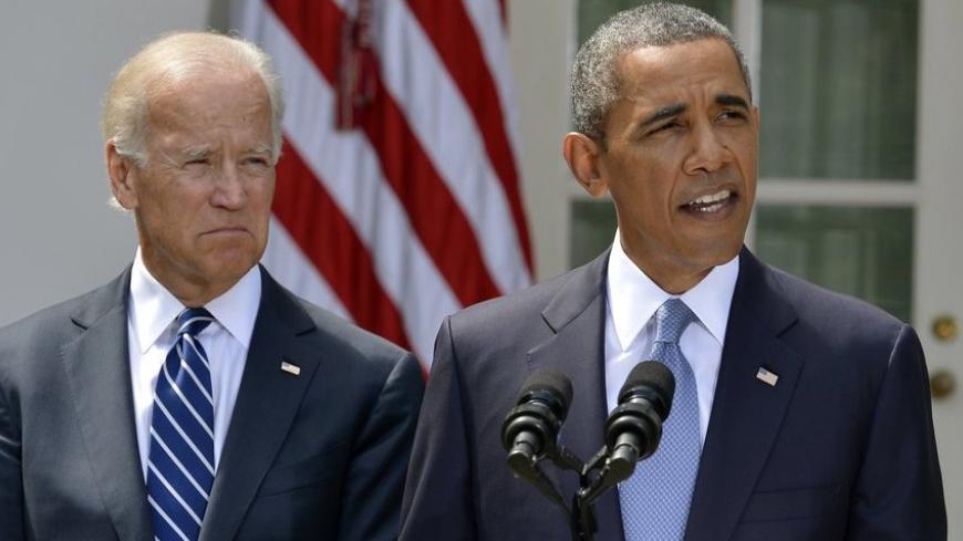U.S. President Barack Obama speaks about Syria next to Vice President Joe Biden (L) at the Rose Garden of the White House August 31, 2013, in Washington. Obama said on Saturday he had decided the United States should strike Syrian government targets in response to a deadly chemical weapons attack, but said he would seek a congressional vote for any military action. REUTERS/Mike Theiler (UNITED STATES - Tags: POLITICS) - RTX132WE