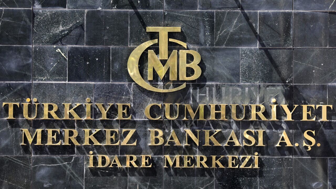 A picture taken on August 14, 2018, shows the logo of Turkey's Central Bank (TCMB) at the entrance of the bank's headquarters in Ankara, Turkey. 