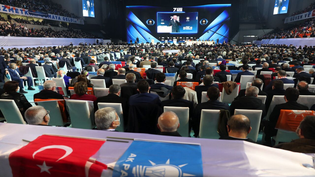 Turkish President and leader of the Justice and Development Party (AKP) Recep Tayyip Erdogan addresses his supporters during a political meeting of his ruling party the AKP, in Ankara, March 24, 2021. 