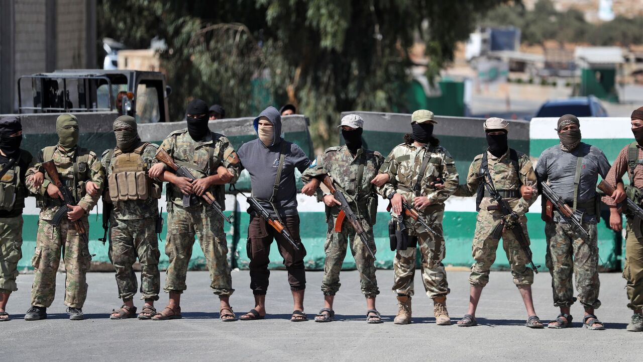 Hayat Tharir al-Sham fighters