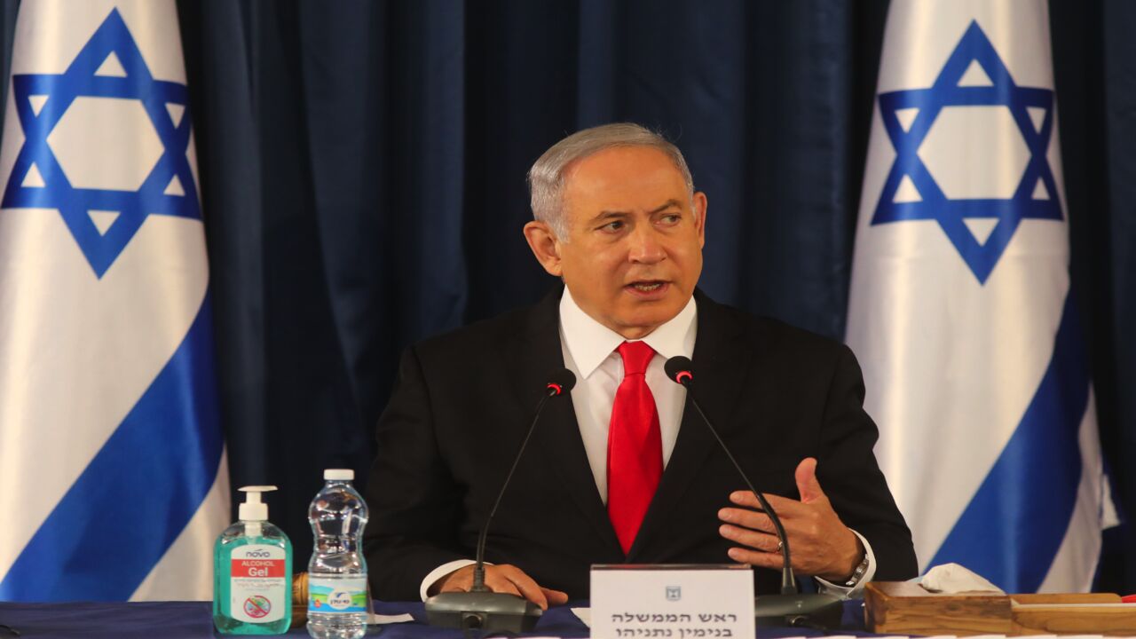 Israeli Prime Minister Benjamin Netanyahu chairs the weekly cabinet meeting in Jerusalem on June 7, 2020. Netanyahu urged world powers to reimpose tough sanctions against Iran, vowing to curb Tehran's regional "aggression" hours after another deadly strike on pro-Iranian fighters in Syria.