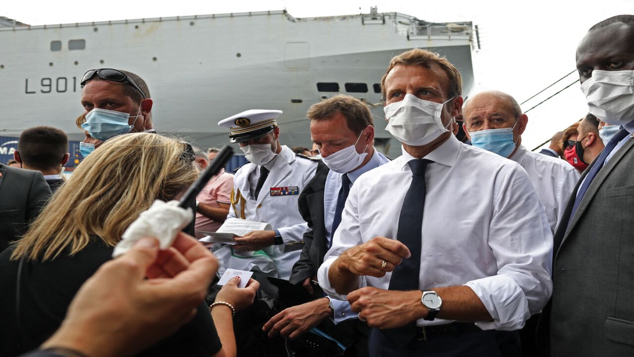 French President Emmanuel Macron (2nd-L) and French Foreign Minister Jean-Yves Le Drian (3rd-L) meet with UN representatives and NGOs mobilized for the reconstruction of Beirut port, on Sept. 1, 2020. Macron pressed his "risky" drive for political change in Lebanon, as the former French mandate marked its centenary while teetering on the brink of the abyss.