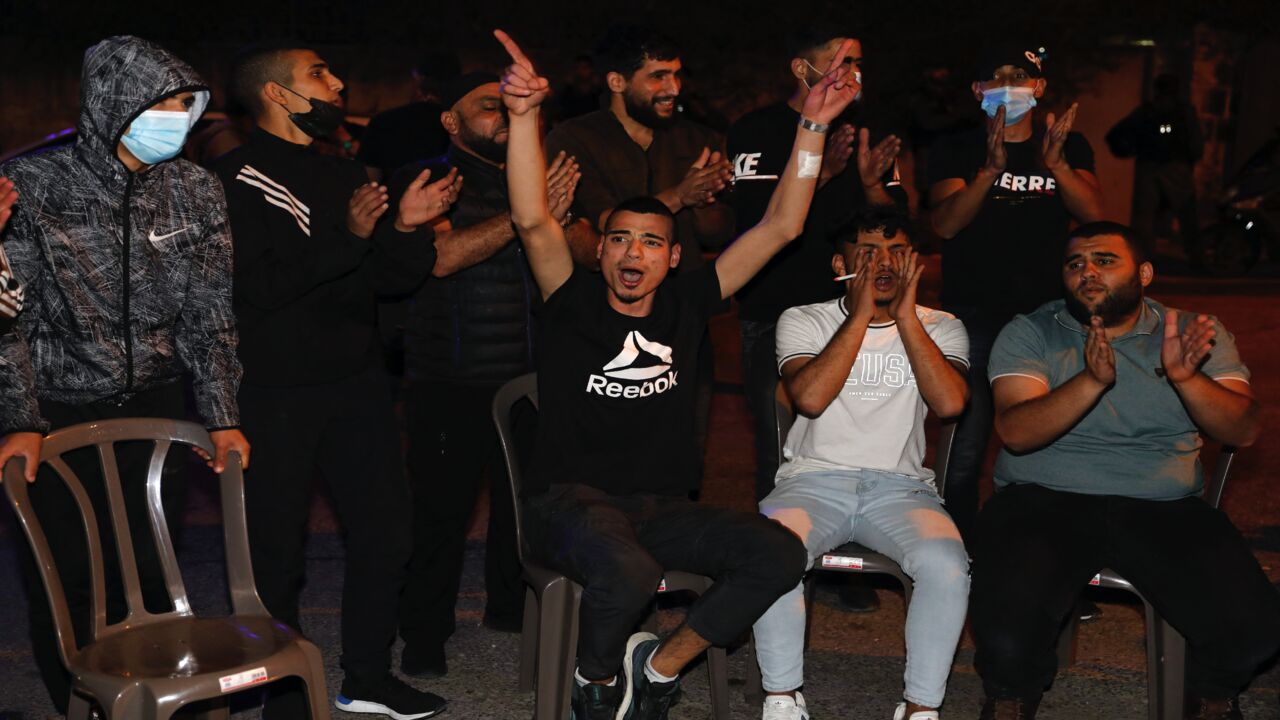 Palestinians protest amid ongoing confrontations as Palestinian families face eviction in the Sheikh Jarrah neighbourhood of East Jerusalem, on May 4, 2021. Israeli Jews backed by courts have taken over houses in Sheikh Jarrah in East Jerusalem on the grounds that Jewish families lived there before fleeing in Israel's 1948 war for independence. The claimants seek to evict a total of 58 more Palestinians, according to the watchdog group Peace Now, and Israel's Supreme Court is set to announce a decision for 