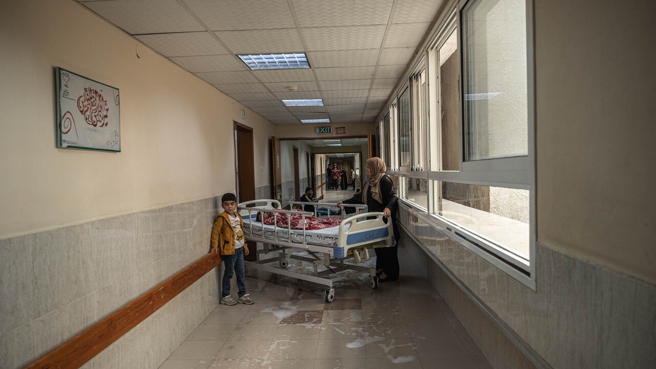 A Palestinian child who was wounded in overnight Israeli air strikes on the Gaza Strip, receives treatment at Al-Shifa Hospital on May 19, 2021 in Gaza City, Gaza.  