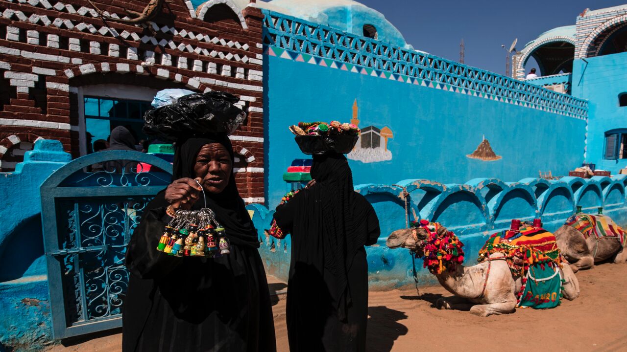 Nubian Egyptian women sell souvenirs in the village of Gharb Suhail near Aswan in Upper Egypt, some 920 kilometers south of the capital, Cairo, on Feb. 5, 2020.