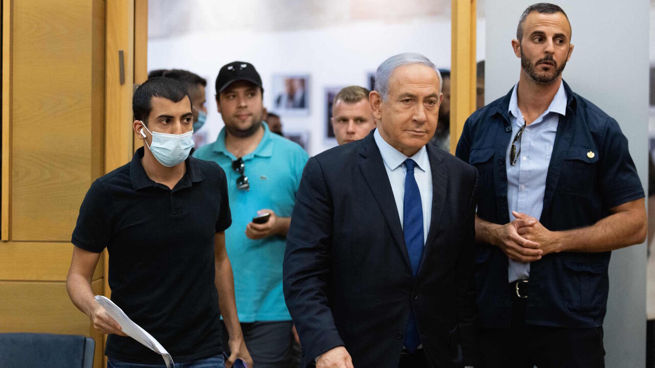 Israeli Prime Minister Benjamin Netanyahu arrives at the Knesset, the Israeli Parliament, to deliver a political statement in Jerusalem, on May 30, 2021.