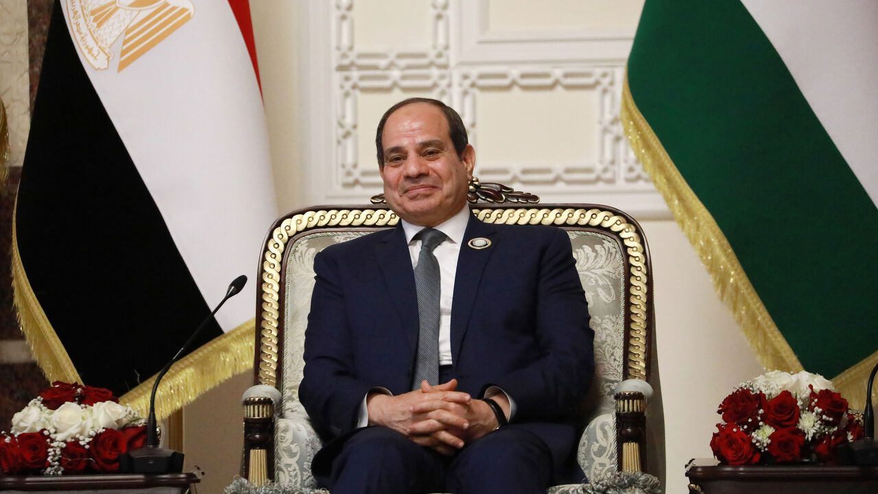 Iraqi Prime Minister Mustafa al-Kadhimi (not seen), Egyptian President Abdel Fattah al-Sisi and Jordanian King Abdullah II (not seen) meet with Iraqi President Barham Salih (not seen) following the "Tripartite Summit" at the Presidential Palace in Baghdad, Iraq on June 27, 2021.