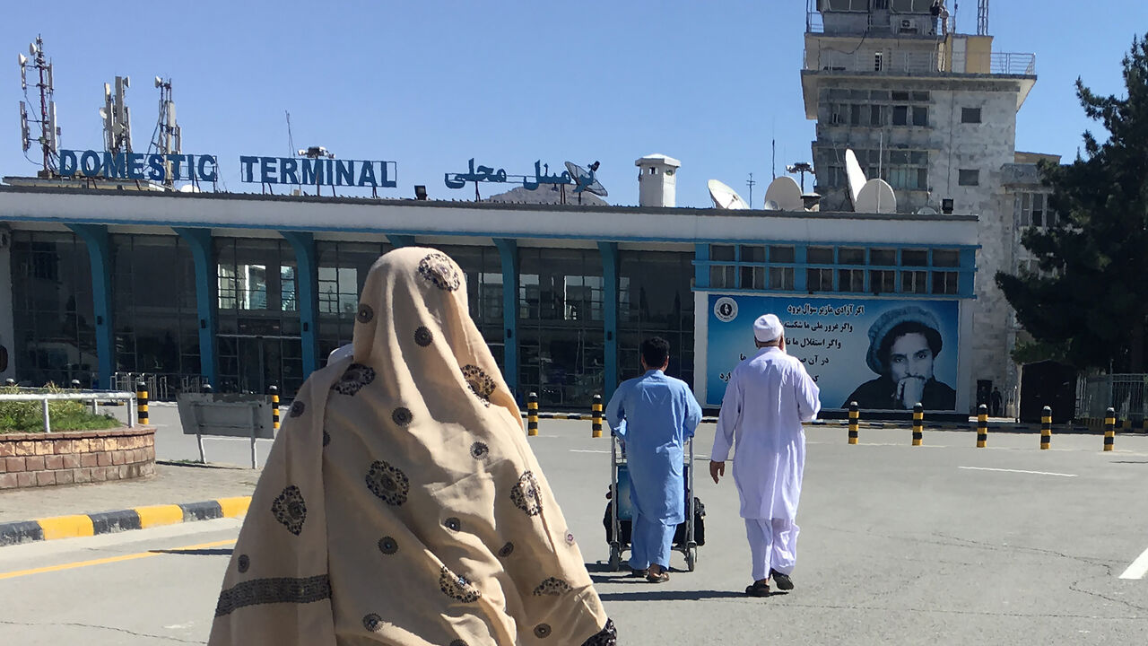 This photo taken on May 8, 2018, shows people arriving at the domestic terminal of the Hamid Karzai International Airport of Kabul.