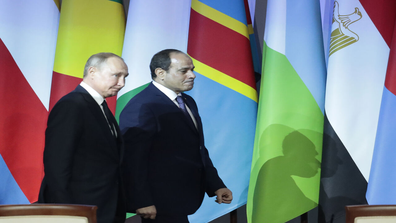 Russian President Vladimir Putin and Egyptian President Abdel Fattah al-Sisi arrive to make a press statement following the 2019 Russia-Africa Summit at the Sirius Park of Science and Art, Sochi, Russia, Oct. 24, 2019.