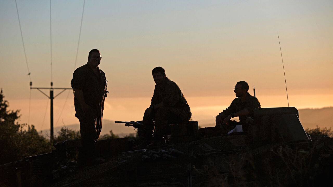 Israeli soldiers are positioned near the northern Israeli settlement of Shtula along the border with Lebanon, on May 19, 2021.