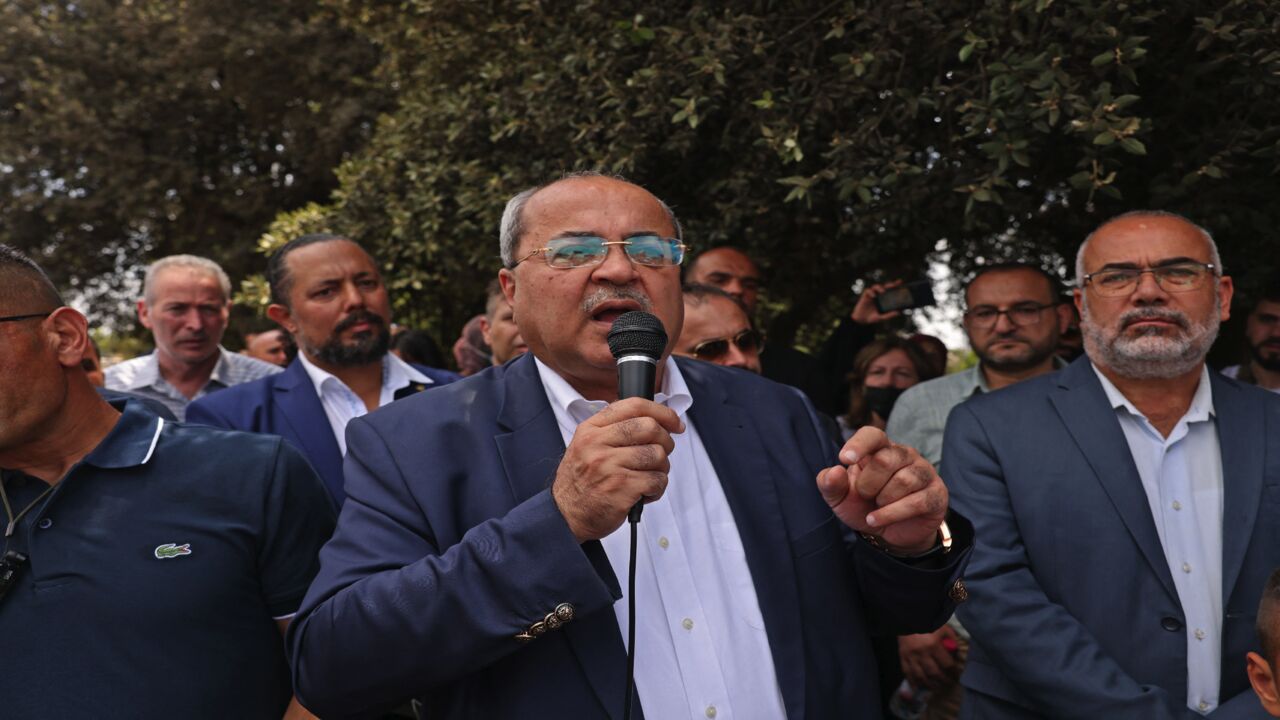 Ahmed Tibi (C), Israeli member of Knesset for the Joint List, speaks during a demonstration by Israeli Arabs.