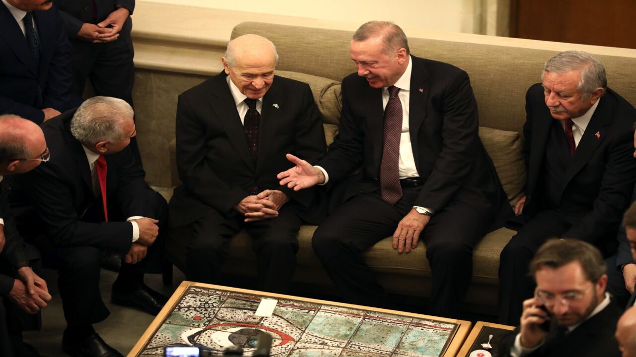Turkish President Recep Tayyip Erdogan (C,R) meets Turkey's Nationalist Movement Party's (MHP) leader Devlet Bahceli (C,L) at the Turkish Grand National Assembly in Ankara, on Nov. 19, 2019.