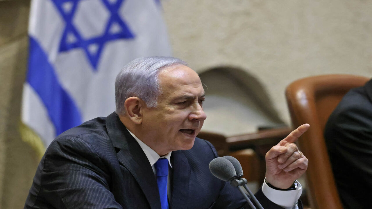 Israeli Prime Minister Benjamin Netanyahu addresses lawmakers during a special session to vote on a new government at the Knesset, Jerusalem, June 13, 2021.