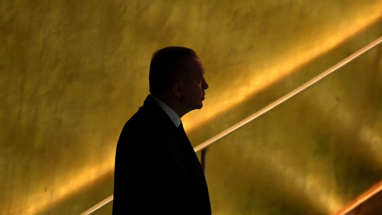 Turkish President Recep Tayyip Erdogan(R) arrives to address the 76th Session of the UN General Assembly on Sept. 21, 2021, in New York.