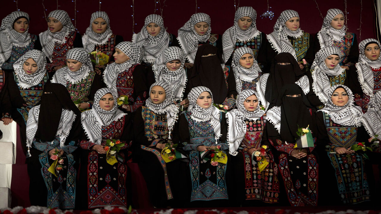Palestinian brides are seen during a mass wedding ceremony, Gaza City, Gaza Strip, Feb. 4, 2014.