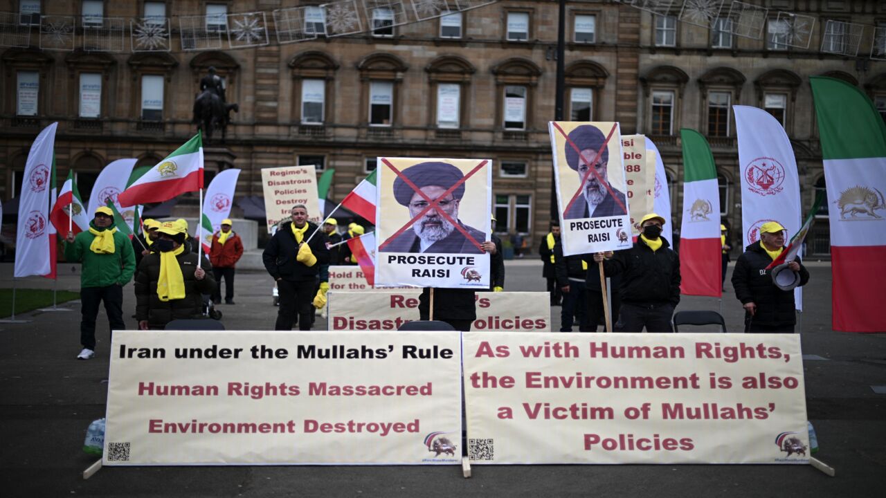 Demonstrators attend a demonstration organized by the Anglo-Iranian Community.