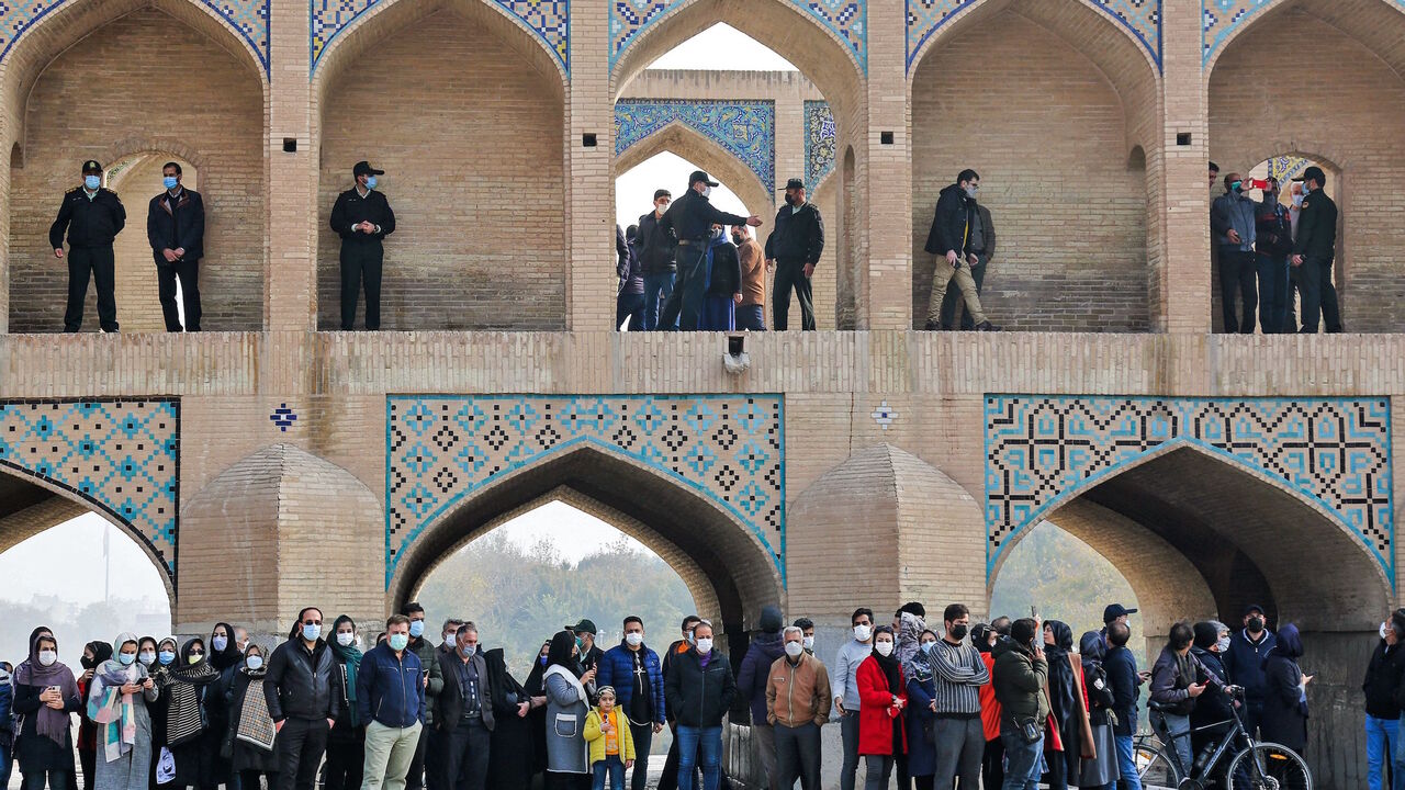 Iranians gather during a protest to voice their anger after their province's lifeblood river dried up due to drought and diversion, in the central city of Isfahan, on Nov. 19, 2021.