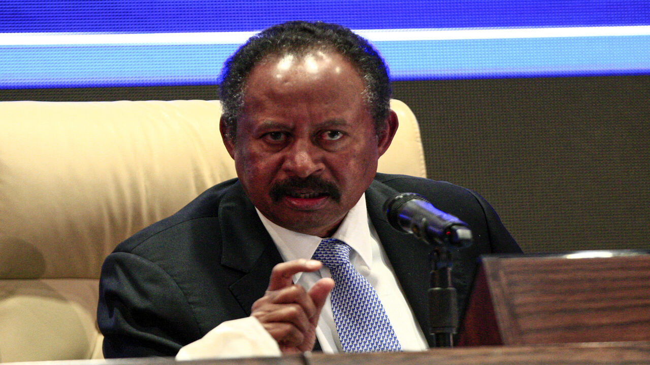 Sudan's new Prime Minister Abdalla Hamdok gestures during a press conference unveiling the first Cabinet since veteran leader Omar al-Bashir's overthrow, Khartoum, Sudan, Sept. 5, 2019.