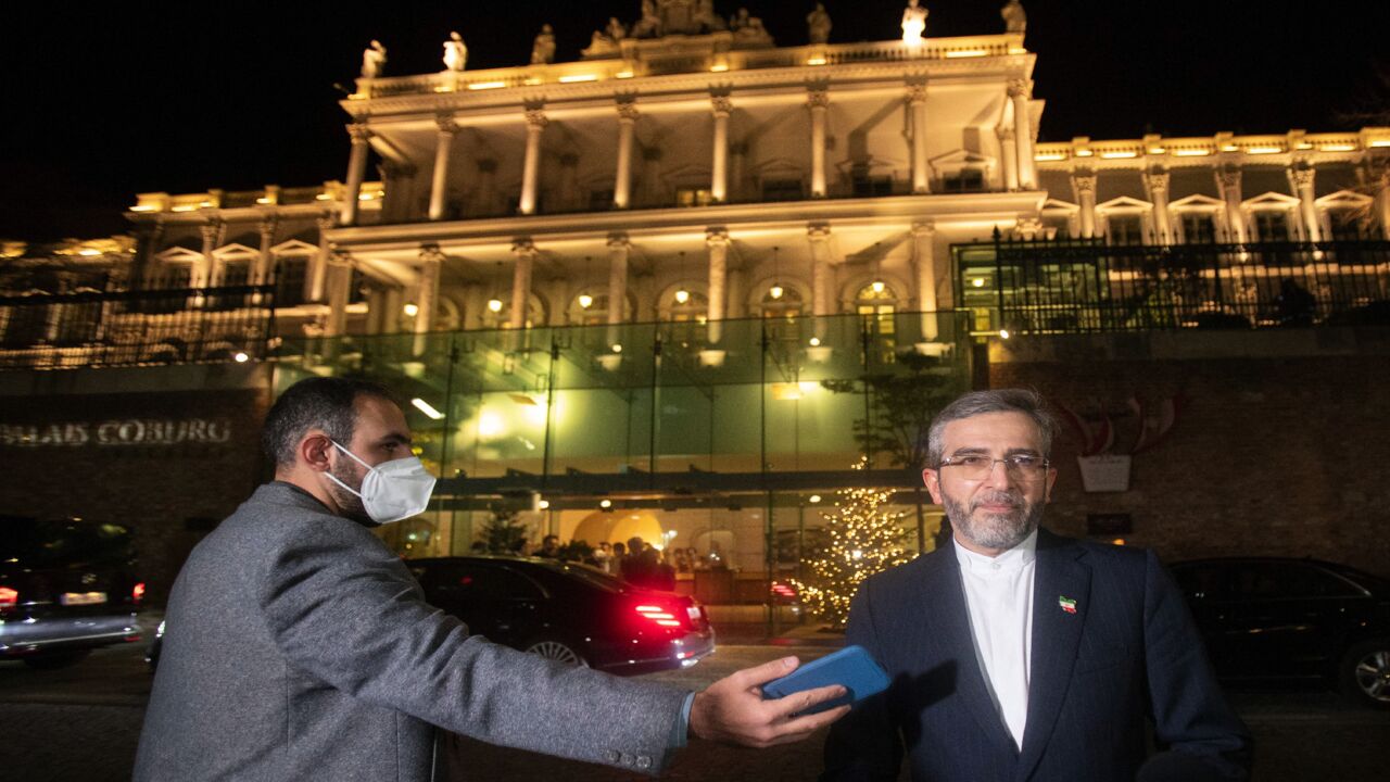 Iran's chief nuclear negotiator Ali Bagheri Kani speaks to the press in front of Palais Coburg, venue for the JCPOA meeting that aims to revive the Iran nuclear deal, in Vienna on Dec. 27, 2021.