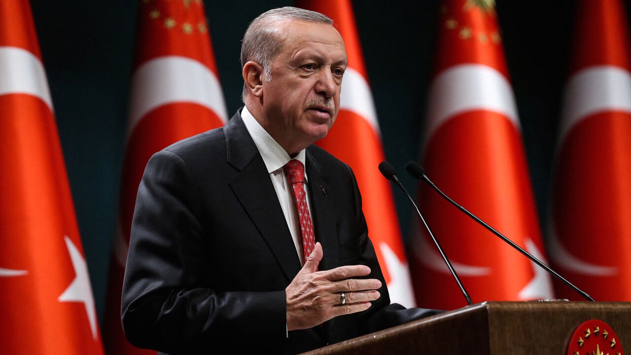 Turkish President Recep Tayyip Erdogan gestures as he delivers a speech following a cabinet meeting, in Ankara, on June 9, 2020.