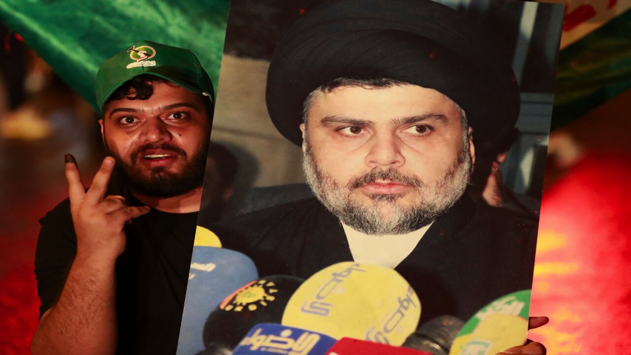 Supporters of Iraqi Shiite cleric Muqtada al-Sadr celebrate in Baghdad's Tahrir Square on Oct. 11, 2021.