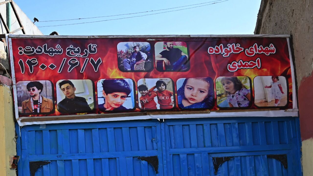 A poster of Aimal Ahmadi's relatives who died in a US drone strike is installed on top of his house in Kabul on Dec. 14, 2021.