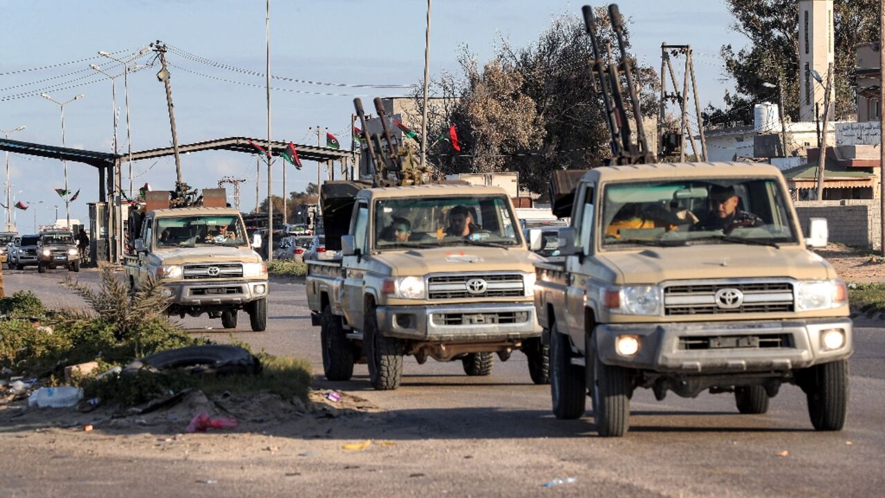 Vehicles of military brigades loyal to the Libyan unity government headed by Abdulhamid Dbeibah arrive from neighbouring towns to the capital Tripoli Vehicles of military brigades loyal to the Libyan unity government headed by Abdulhamid Dbeibah arrive from neighbouring towns to the capital Tripoli