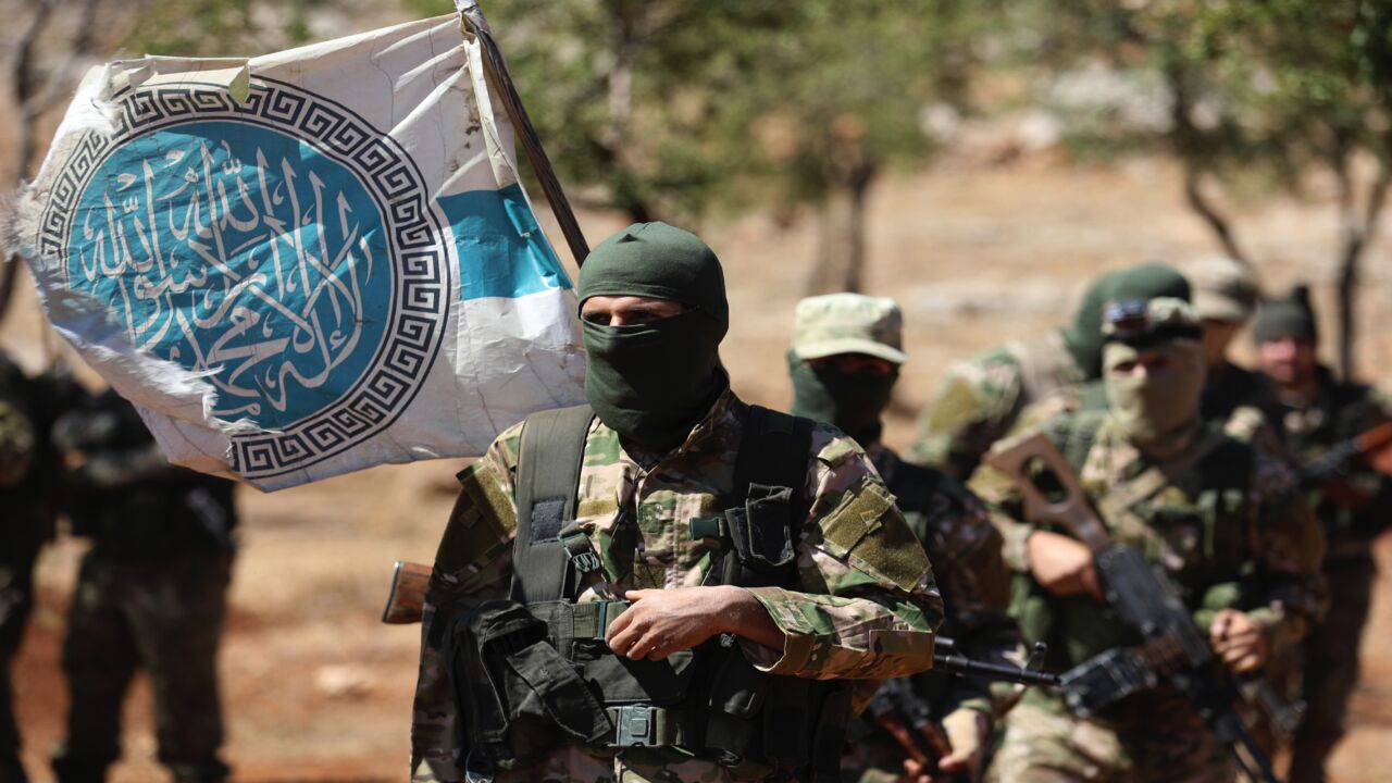 Syrian fighters at the graduation of new Hayat Tahrir al-Sham members in Idlib province on Aug. 14, 2018.