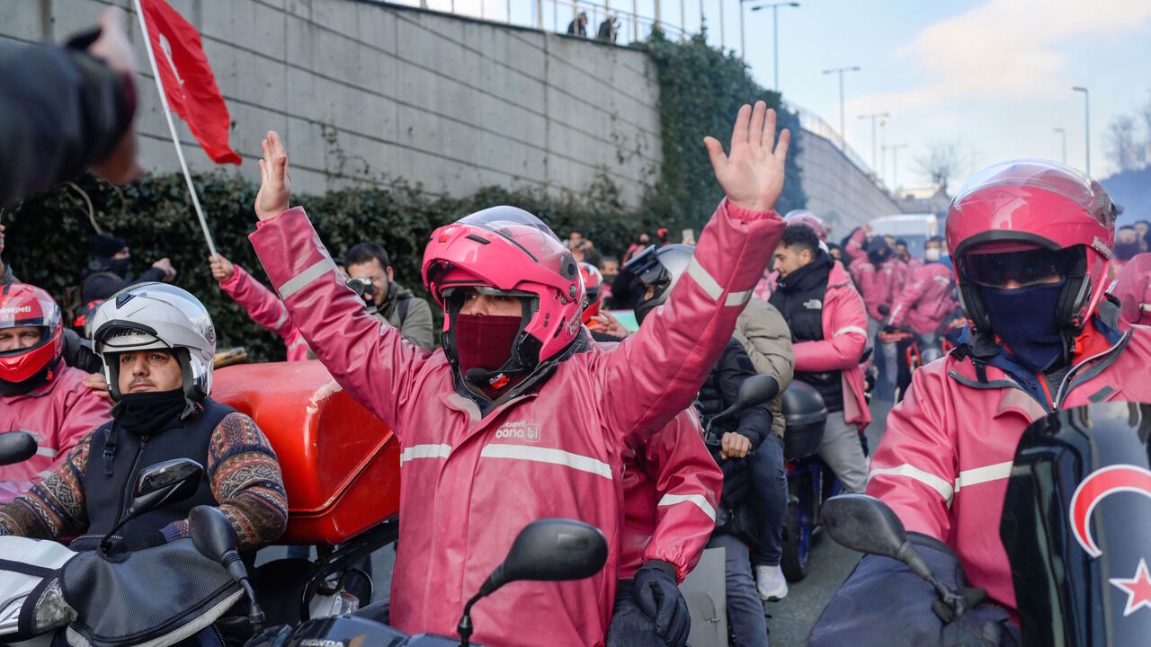 Delivery couriers of Yemeksepeti demonstrate to demand higher wages in front of the company's headquarters in Istanbul, on Feb. 5, 2022.