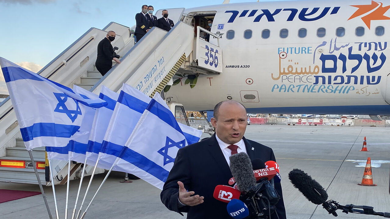 Israeli Prime Minister Naftali Bennett delivers a speech upon his departure to Bahrain, at Ben Gurion Airport, near Tel Aviv, Feb. 14, 2022.