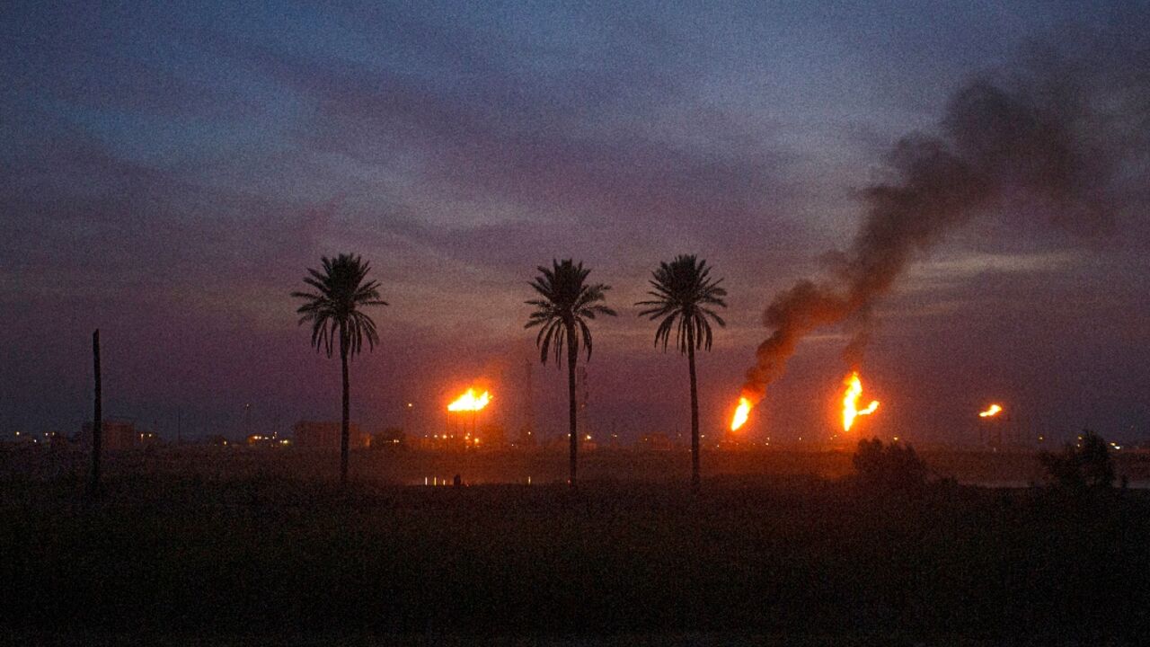 Analysts say the wasted flared gas, such as pictured in the Nahr Bin Omar oil field, is particularly egregious as Iraq is a significant importer of natural gas