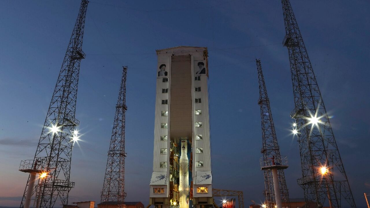 A picture released by Iran's defence ministry shows a Simorgh (Phoenix) rocket ready for launch from an undisclosed desert location A picture released by Iran's defence ministry shows a Simorgh (Phoenix) rocket ready for launch from an undisclosed desert location