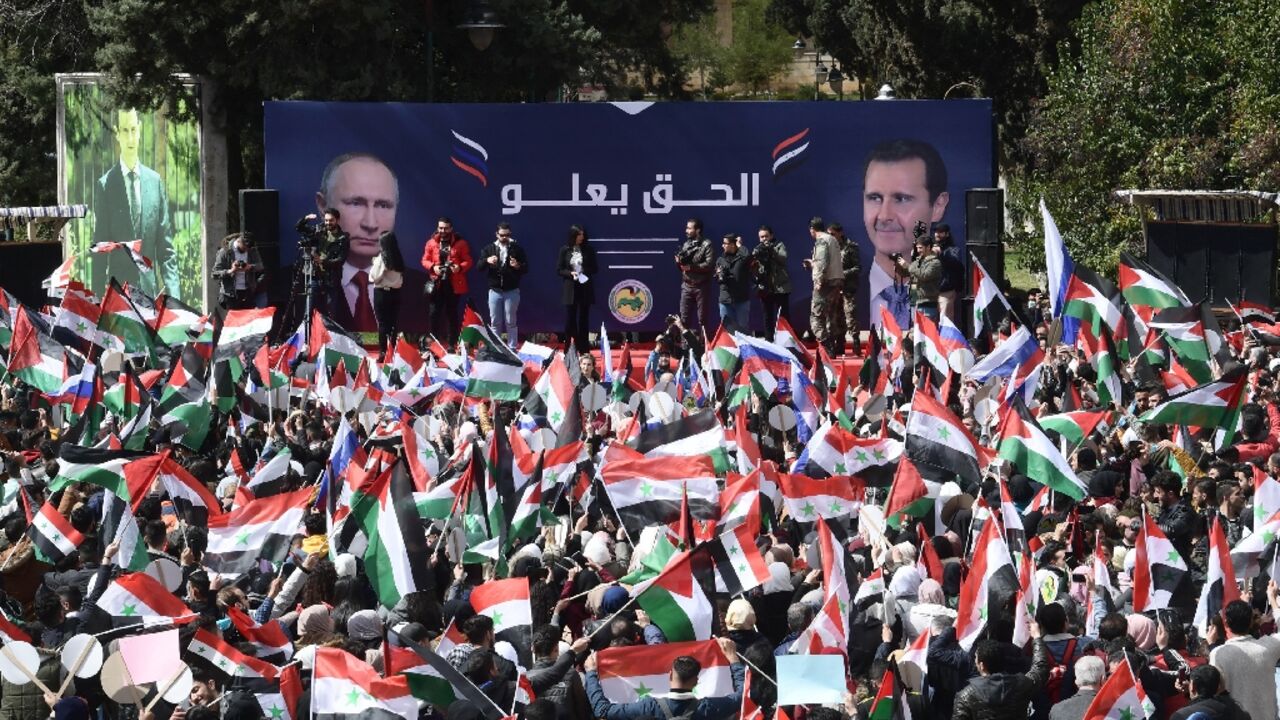 Students demonstrate in support of Russia following its invasion of Ukraine, at a university campus in the Syrian city of Aleppo on March 10, 2022