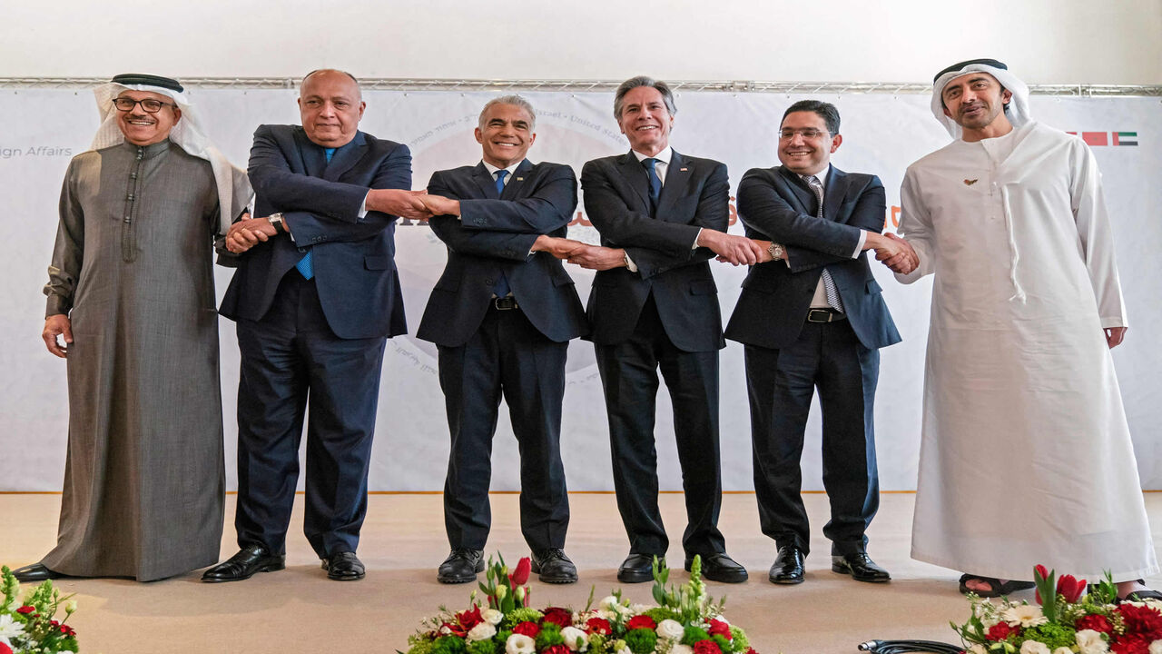 Bahrain's Foreign Minister Abdullatif bin Rashid Al Zayani, Egypt's Foreign Minister Sameh Shoukry, Israel's Foreign Minister Yair Lapid, US Secretary of State Antony Blinken, Morocco's Foreign Minister Nasser Bourita and United Arab Emirates' Foreign Minister Sheikh Abdullah bin Zayed Al Nahyan, pose for a group photo following their Negev meeting in the kibbutz of Sde Boker, Israel, March 28, 2022.