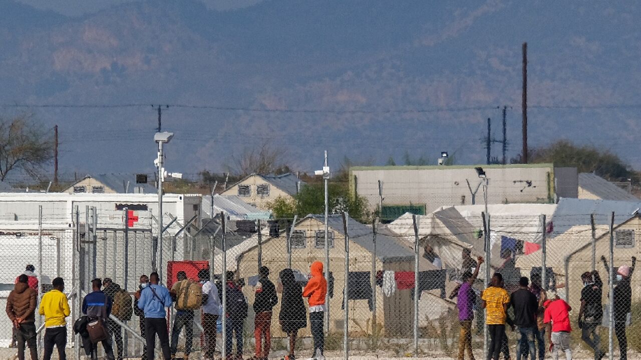 Migrants at the Pournara camp on the outskirts of the Cypriot capital Nicosia Migrants at the Pournara camp on the outskirts of the Cypriot capital Nicosia