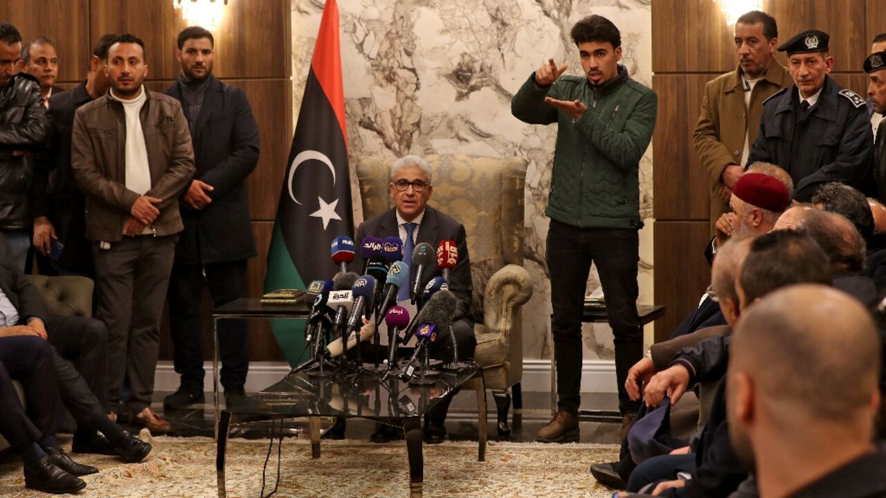 Former interior minister Fathi Bashagha (seated) was designated by parliament as prime minister earlier this month, in a challenge to the authority of incumbent premier Abdulhamid Dbeibah Former interior minister Fathi Bashagha (seated) was designated by parliament as prime minister earlier this month, in a challenge to the authority of incumbent premier Abdulhamid Dbeibah