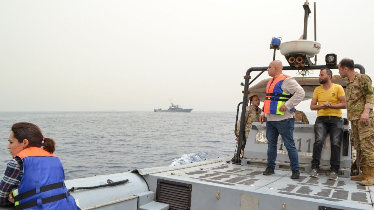 Lebanese soldiers search for survivors off the coast of the northern Lebanese city of Tripoli on April 24, 2022, after an overloaded migrant boat capsized 