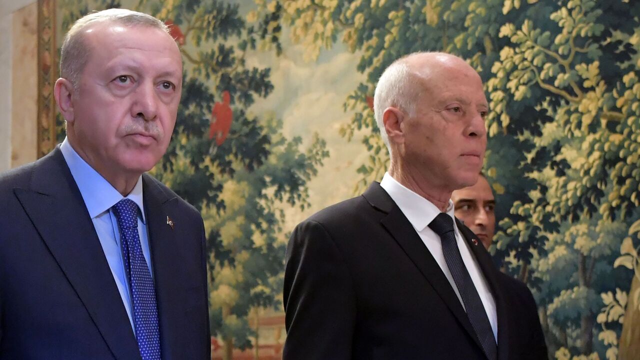 Tunisian President Kais Saied (R) arrives with Turkish President Recep Tayyip Erdogan.