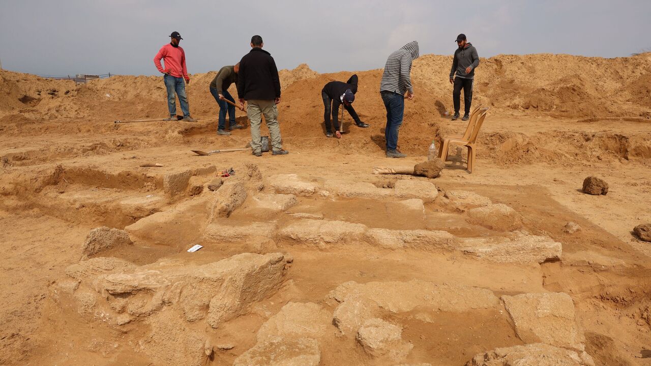 Palestinian workers excavate a newly discovered Roman cemetery.