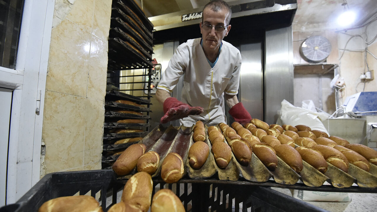 An Algerian employee prepares bread at a bakery in the capital Algiers, on Feb. 27, 2022.  