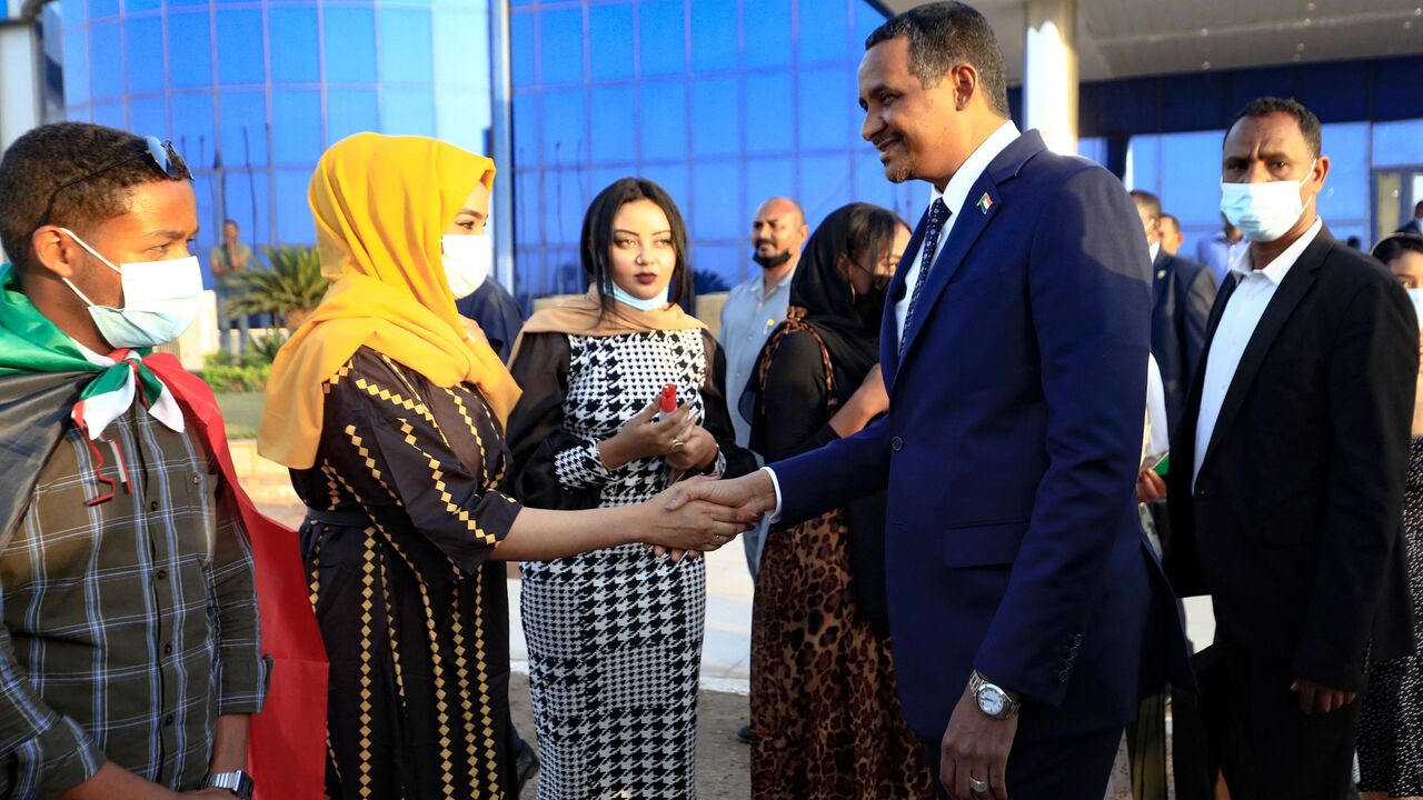 Sudan's military leader Mohamed Hamdan Dagalo (Hemedti) is greeted.